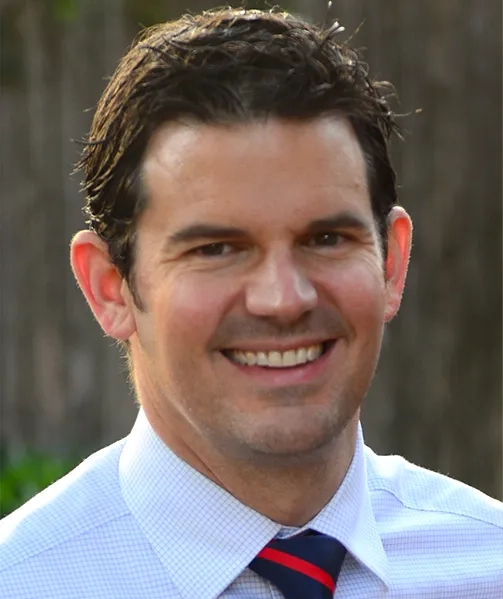 Male doctor smiling